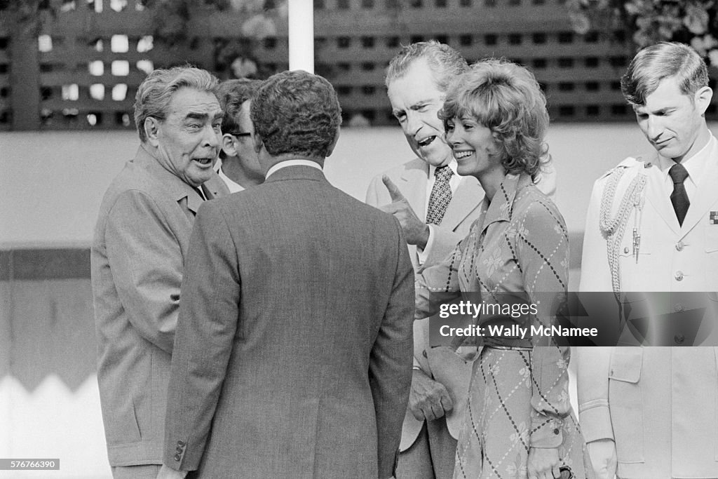 Brezhnev and Jill St. John at Nixon Pool Party