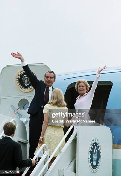 The Nixon family boards Air Force One for the flight to California following Richard Nixon's resignation. Daughter Tricia Nixon and her husband...