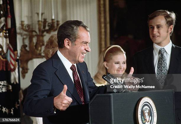 The day after resigning from the presidency, Richard Nixon gives a farewell speech to his staff. His wife Pat, daughter Tricia and son-in-law Edward...