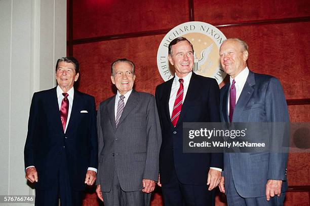 Current and former US presidents pose for a picture at dedication ceremonies for the Richard Nixon Library and Birthplace. From left to right: Ronald...