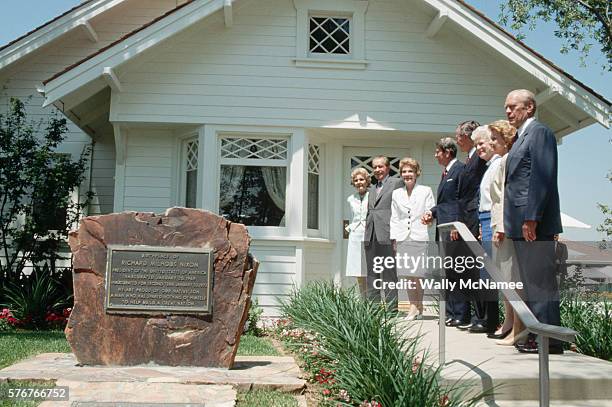 Current and former US presidents pose with their wives for a picture at dedication ceremonies for the Richard Nixon Library and Birthplace. The house...