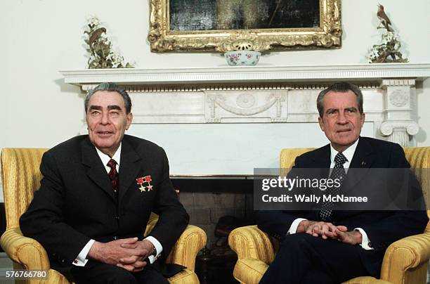 Soviet leader Leonid Brezhnev and President Richard Nixon sit in the Oval Office during the 1973 US-USSR summit.