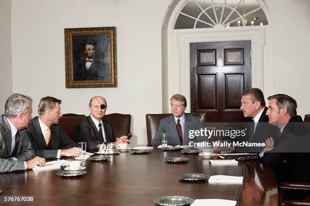 President Carter presides over a meeting between chief US and Israeli officials discussing the conditions for peace between Israel and Egypt. From...