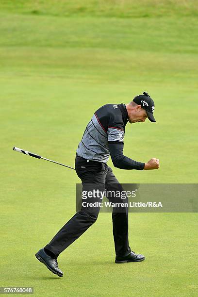 Henrik Stenson of Sweden reacts to a birdie putt on the 15th green during the final round on day four of the 145th Open Championship at Royal Troon...
