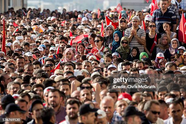 People pray at the funeral for police officers and solidiers killed during Friday's failed coup attempt at Kocatepe Mosque on July 17, 2016 in...