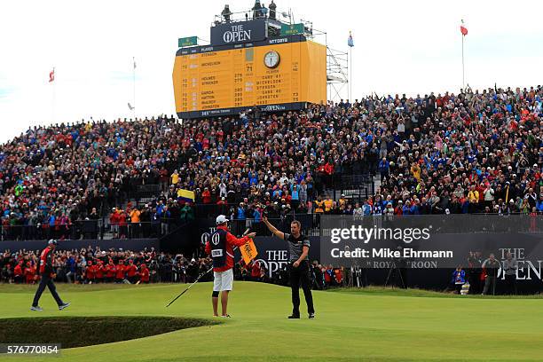 Henrik Stenson of Sweden celebrates victory after the winning putt during the final round on day four of the 145th Open Championship at Royal Troon...