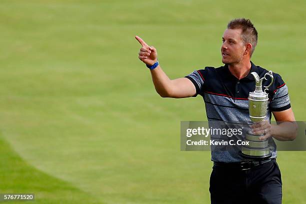 Henrik Stenson of Sweden celebrates victory with the Claret Jug after the final round on day four of the 145th Open Championship at Royal Troon on...
