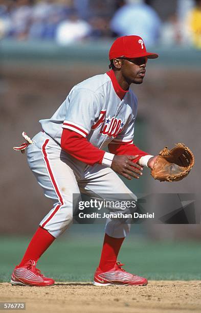Jimmy Rollins of the Philadelphia Phillies gets ready for the ball during the game against the Chicago Cubs at Wrigley Field in Chicago, Illinois....