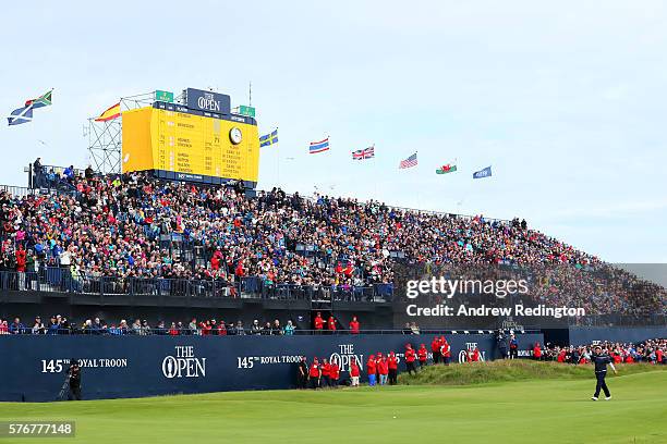 Andrew Johnston of England acknowledges the crowd as he walks to the the 18th green during the final round on day four of the 145th Open Championship...