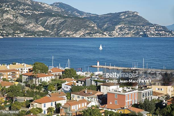 the sea between village and mountain - jean marc payet stock pictures, royalty-free photos & images