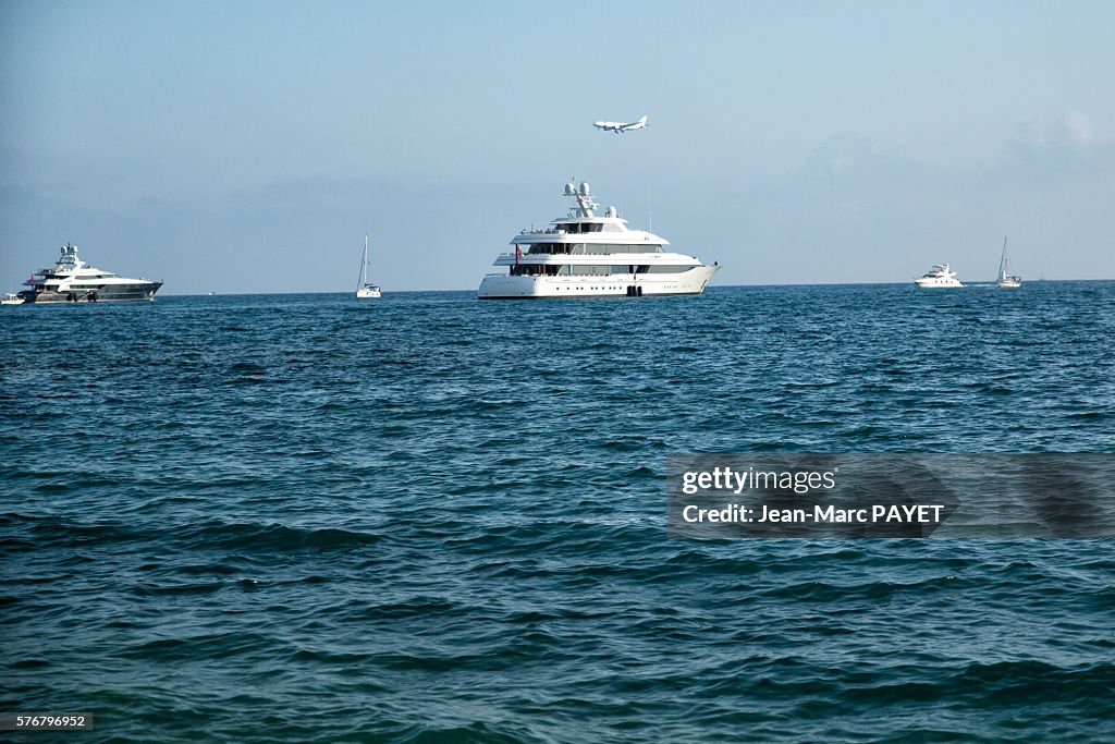 Boat and air plain on the sea