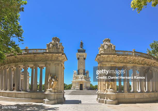 buen retiro park monument to alfonso xii rear view - madrid buen retiro park stock pictures, royalty-free photos & images