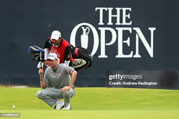 Webb Simpson of the United States lines up a putt on the 18th green during the final round on day four of the 145th Open Championship at Royal Troon...