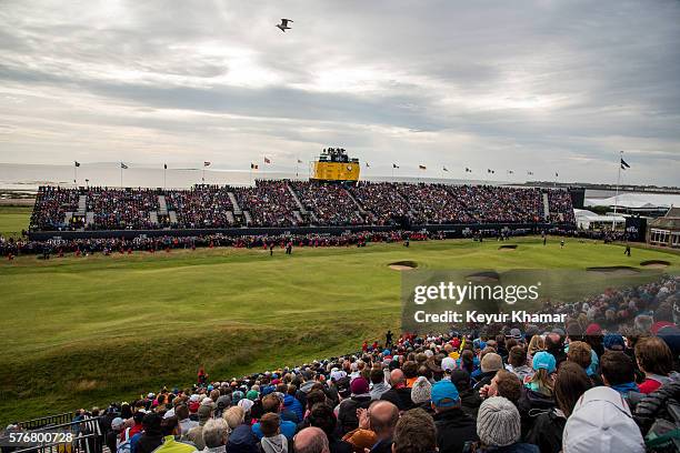 Course scenic view as fans in the grandstands watch leaders Henrik Stenson and Phil Mickelson play the 18th hole green during the final round on day...