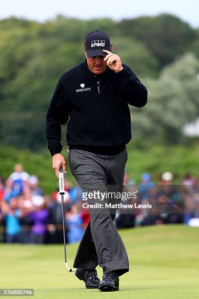Phil Mickelson of the United States celebrates his putt on the 12th during the final round on day four of the 145th Open Championship at Royal Troon...