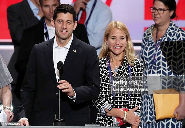 Speaker of the House Paul Ryan speaks during a microphone test along with his wife Janna Ryan prior to the start of the Republican National...