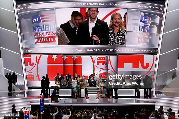 Speaker of the House Paul Ryan speaks during a microphone test along with his wife Janna Ryan prior to the start of the Republican National...