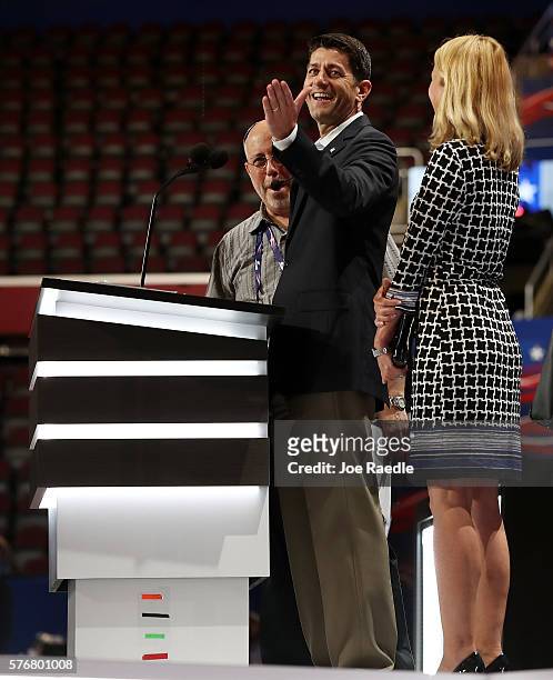 Speaker of the House Paul Ryan speaks during a microphone test along with his wife Janna Ryan prior to the start of the Republican National...