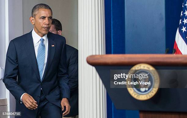 President Obama arrives to speak at a press conference in the Brady Press Briefing Room at the White House on July 17, 2016 in Washington, DC. Obama...