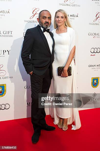 Gaurav Sinha and Lucy Bruce attend the Global Gift Gala 2016 red carpet at Gran Melia Don pepe Resort on July 17, 2016 in Marbella, Spain.