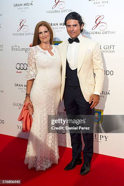 Olivia de Borbon and Julian Porras attend the Global Gift Gala 2016 red carpet at Gran Melia Don pepe Resort on July 17, 2016 in Marbella, Spain.