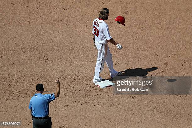 Second base umpire Ron Kulpa signals out after Jayson Werth of the Washington Nationals was forced out a second base for the third out of the seventh...