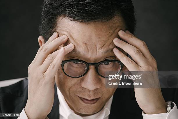 Ricky Wong, chairman of Hong Kong Television Network Ltd. , listens during an interview in Hong Kong, China, on Wednesday, July 6, 2016. Hong Kong is...