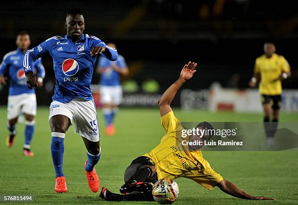 Deiver Machado of Millonarios vies for the ball with Juan Arboleda of Alianza Petrolera, during a match between Millonarios and Alianza Petrolera as...