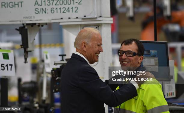 Vice President Joe Biden meets workers on the factory floor during a tour of the Boeing Aerostructures Australia plant at Fishermans Bend in...