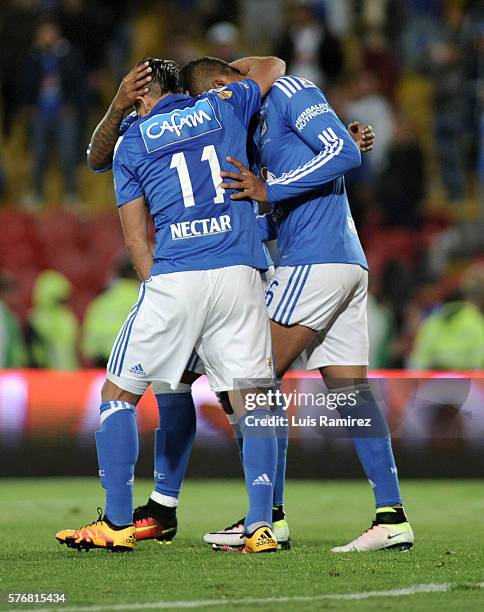 Ayron Del Valle of Millonarios, celebrates with teammates after scoring the opening goal during a match between Millonarios and Alianza Petrolera as...