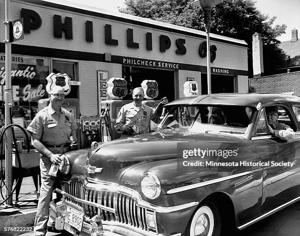 Attendants and Motorist at Phillips Serv