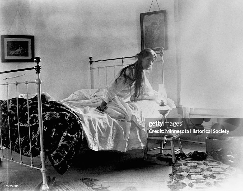 Woman Getting out of Bed