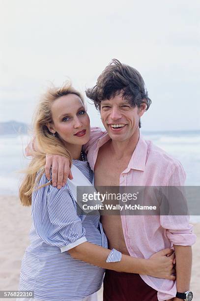 Mick Jagger and girlfriend Jerry Hall on the beach at Barbados, just prior to his 40th birthday.