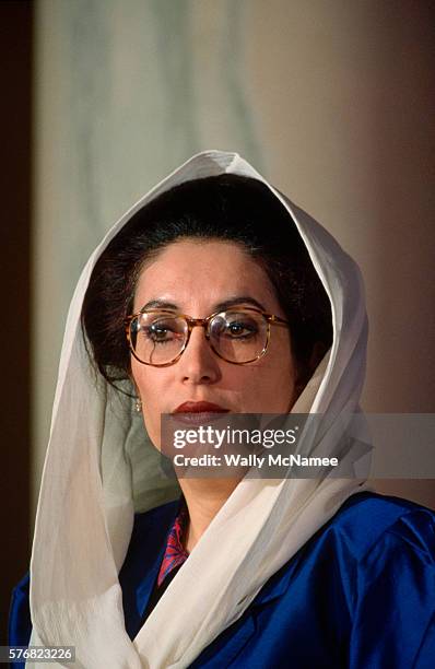 Benazir Bhutto, Prime Minister of Pakistan, listens to remarks by President Clinton during her state visit.