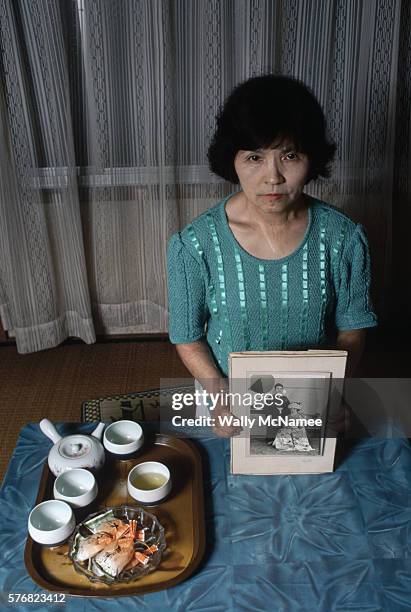 hiroshima survivor with wedding picture - anniversary mark stock pictures, royalty-free photos & images