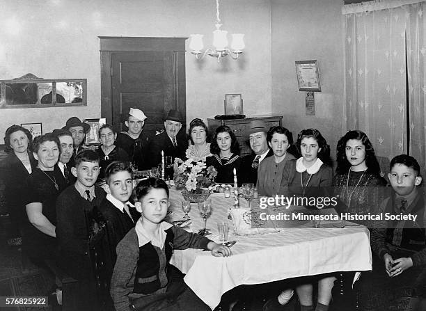 Jewish family welcomes home their Navy man and gathers for a Passover seder at their home in St. Paul, Minnesota.