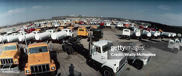 Newly assembled truck cabs fill a lot at the International Harvester truck manufacturing plant near Springfield, Ohio. The assembly plant can be seen...