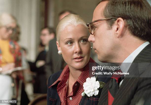 Former White House counsel John Dean sits with wife, Maureen, waiting to testify before the Senate Select Committee on watergate. Dean testified that...