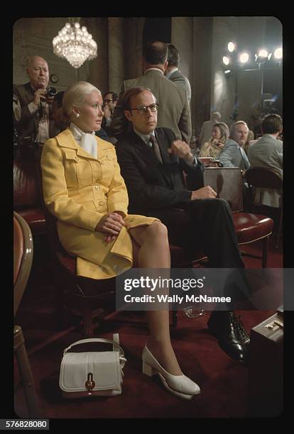 Former White House counsel John Dean sits with wife, Maureen, waiting to testify before the Senate Select Committee on watergate. Dean testified that...