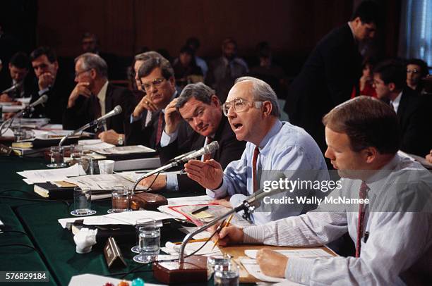 Senator Phil Gramm speaks at a hearing of the Senate Budget Committee surrounded by fellow Republicans.