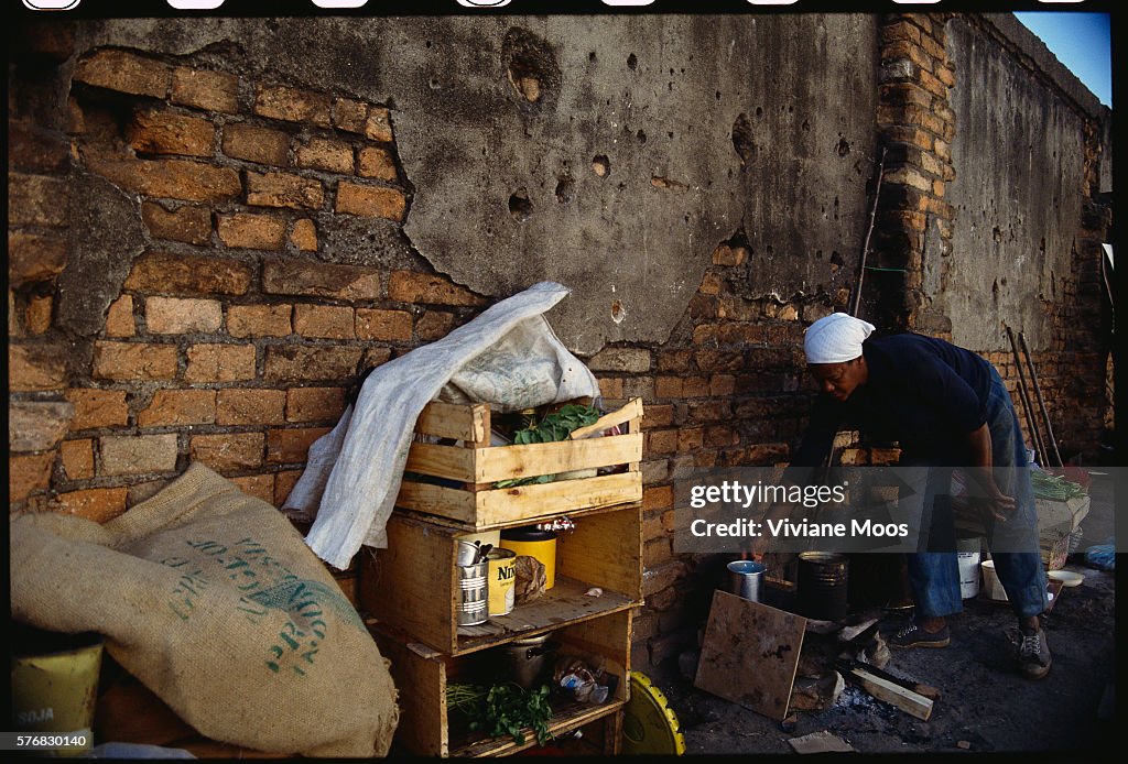 Homeless Brazilian Woman Cooks on the Street