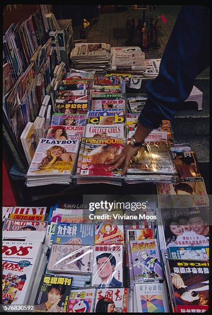 Selling Magazines Magazine Vendor Photos and Premium High Res Pictures - Getty Images