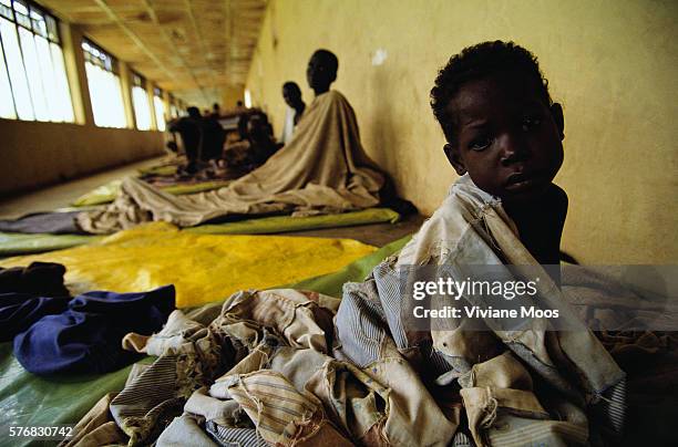 Sudanese child suffering from malnutrition seeks help at a hospital in Aswa, Sudan. Civil war and widespread famine have ravaged Sudan for decades,...