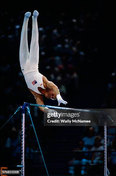 The U.S. Men's team won gold in this competition. This is American gymnast Bart Conner on the parallel bars during the men's team gymnastics...