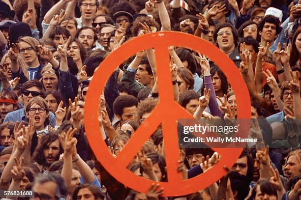 Large peace sign is held up by activists during a Vietnam War demonstration on Capitol Hill.