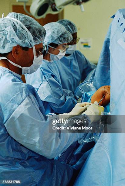 Patient undergoing arthroscopic surgery on his shoulder at Beth Israel Hospital in New York City.