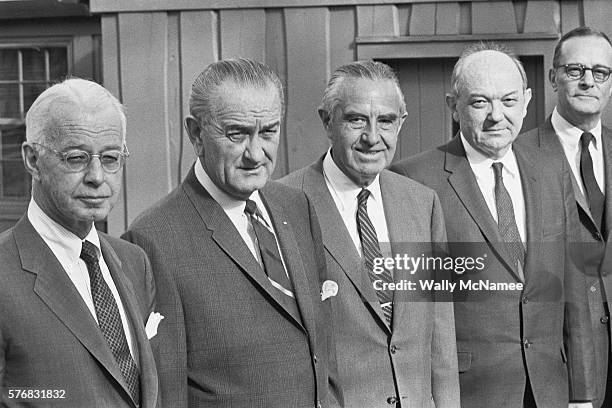 President Johnson is joined by several of his top advisors at Camp David to discuss the Vietnam War. It is believed by some that the meeting was held...