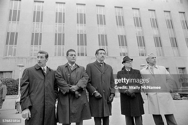 During their trial at a district court, the defendants charged with breaking into the Democratic National Committee offices at the Watergate complex...