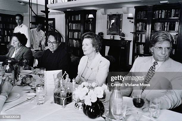 British Prime Minister Margaret Thatcher attending a dinner with restaurateur David Tang and Duty Free Shops founder Robert Miller in Hong Kong.