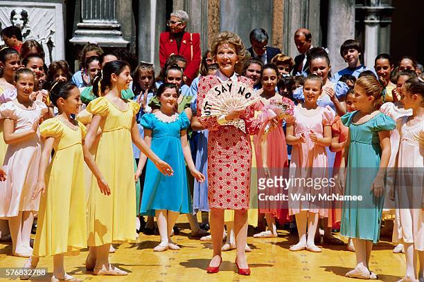 First Lady Nancy Reagan holds up a lace fan which says "Just Say No", an anti-drug campaign slogan, during a visit to Venice, Italy.